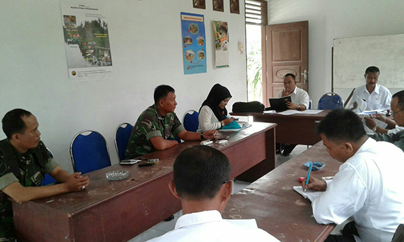 BABINSA KORAMIL 08/SECANGGANG HADIRI RAPAT EVALUASI PERTANIAN