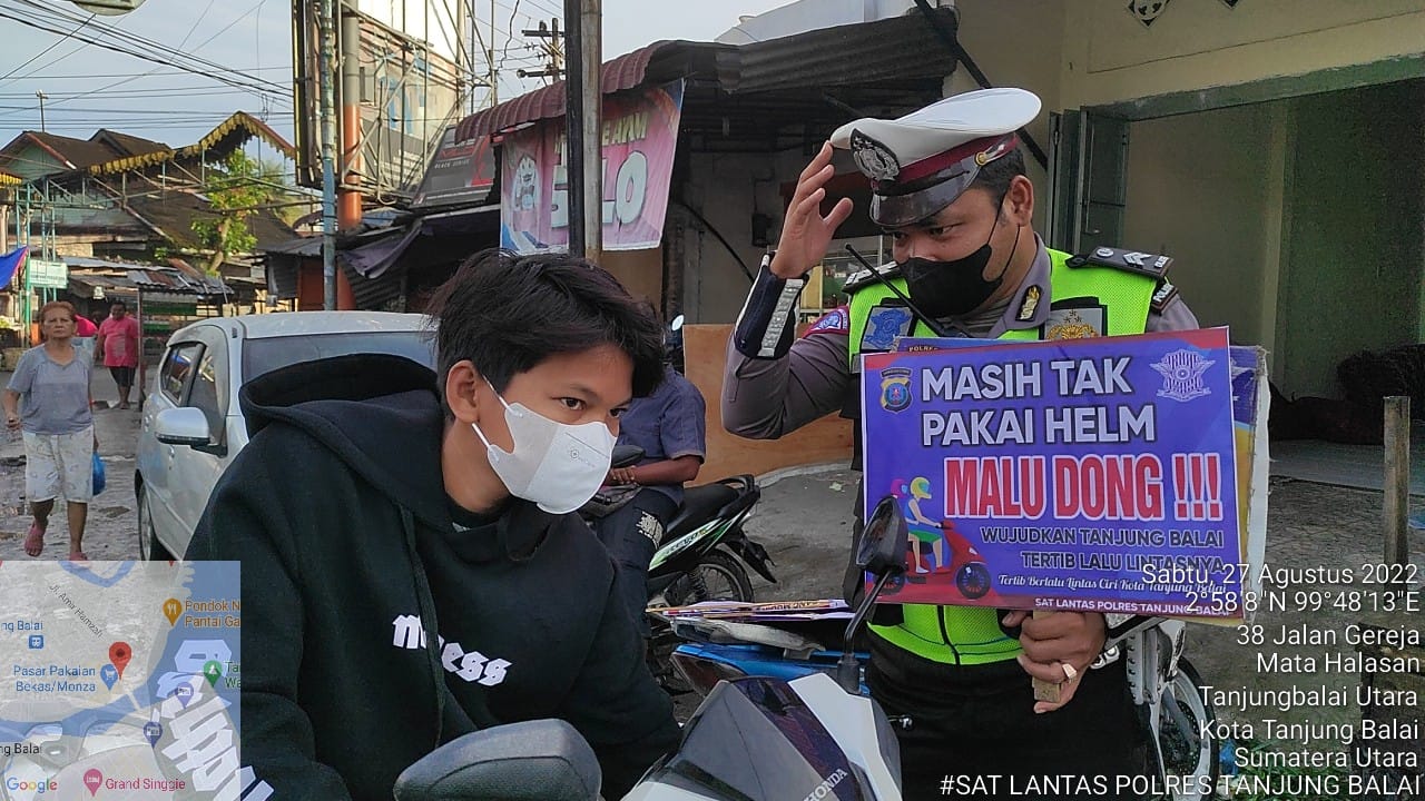 Satlantas Polres Tanjungbalai Rutin Himbauan Pengendara Roda Dua Memakai Helm SNI dan Tertib Berlalu Lintas
