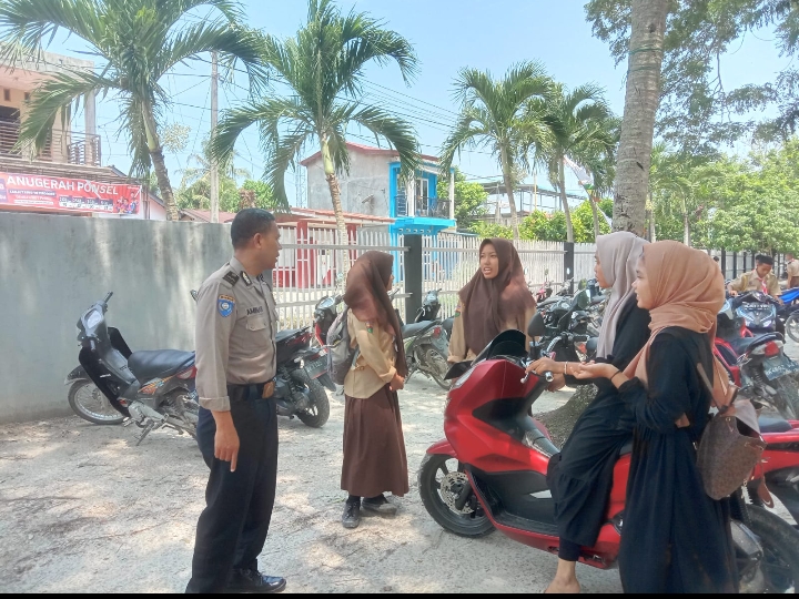 Bhabinkamtibmas Polsek Kota Kisaran Timur Sampaikan Pesan Kamtibmas di Dusun III Desa Rawang Lama