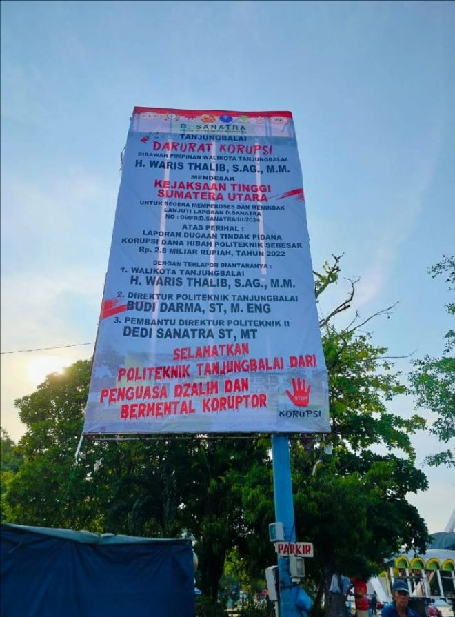 Baliho Mendesak Kejatisu Segera Usut Wali KotaTanjunbalai Kini Terpampang