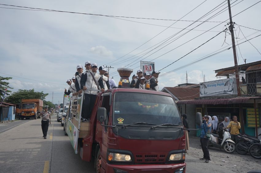 Asisten Perekonomian dan Pembangunan Sambut Kirab Api PON XXI Aceh-Sumut