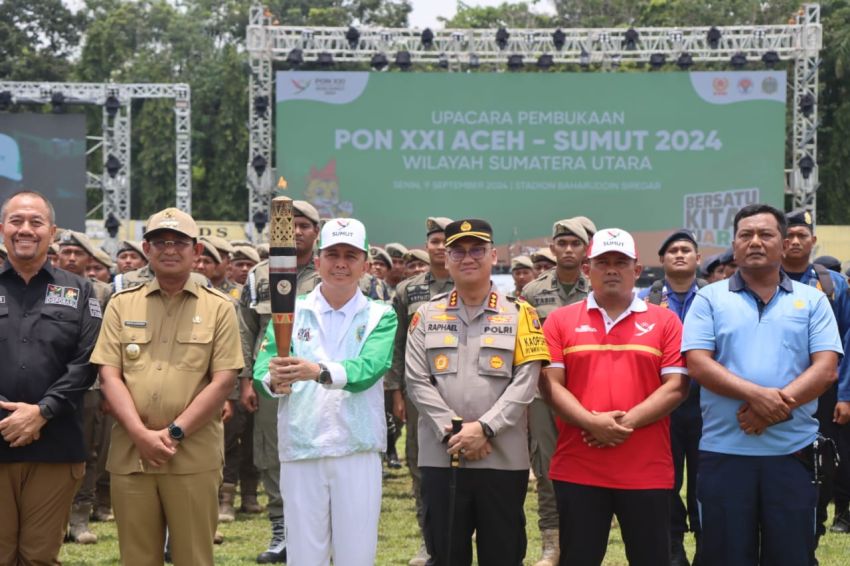 Kapolresta Deli Serdang Hadiri Penyerahan Kirab Api PON Kepada PJ Gubernur Sumut