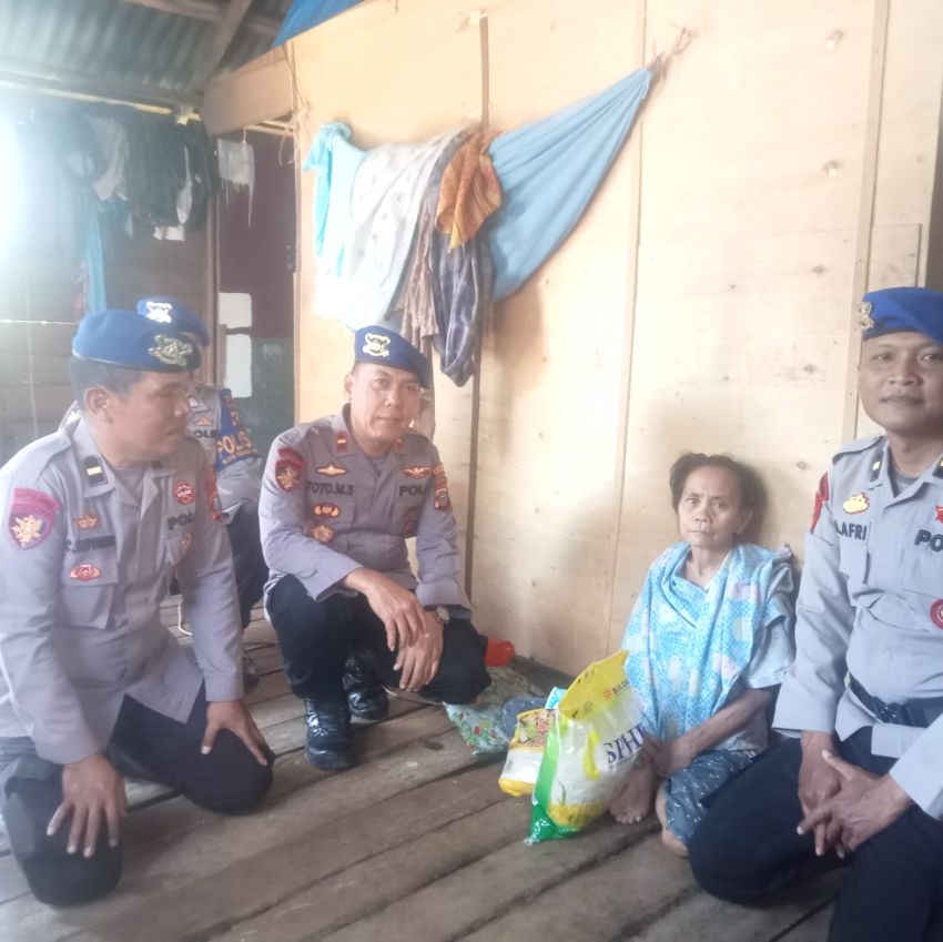 Satpolairud Polres Asahan Berbagi Sembako ke Warga Desa Bagan Asahan